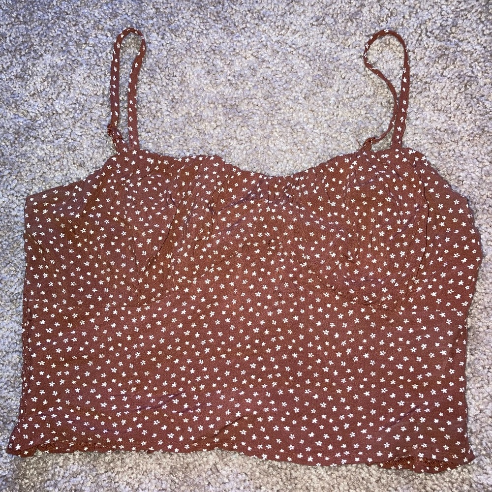 brown tank with white flower pattern. brand: PacSun, size: Small